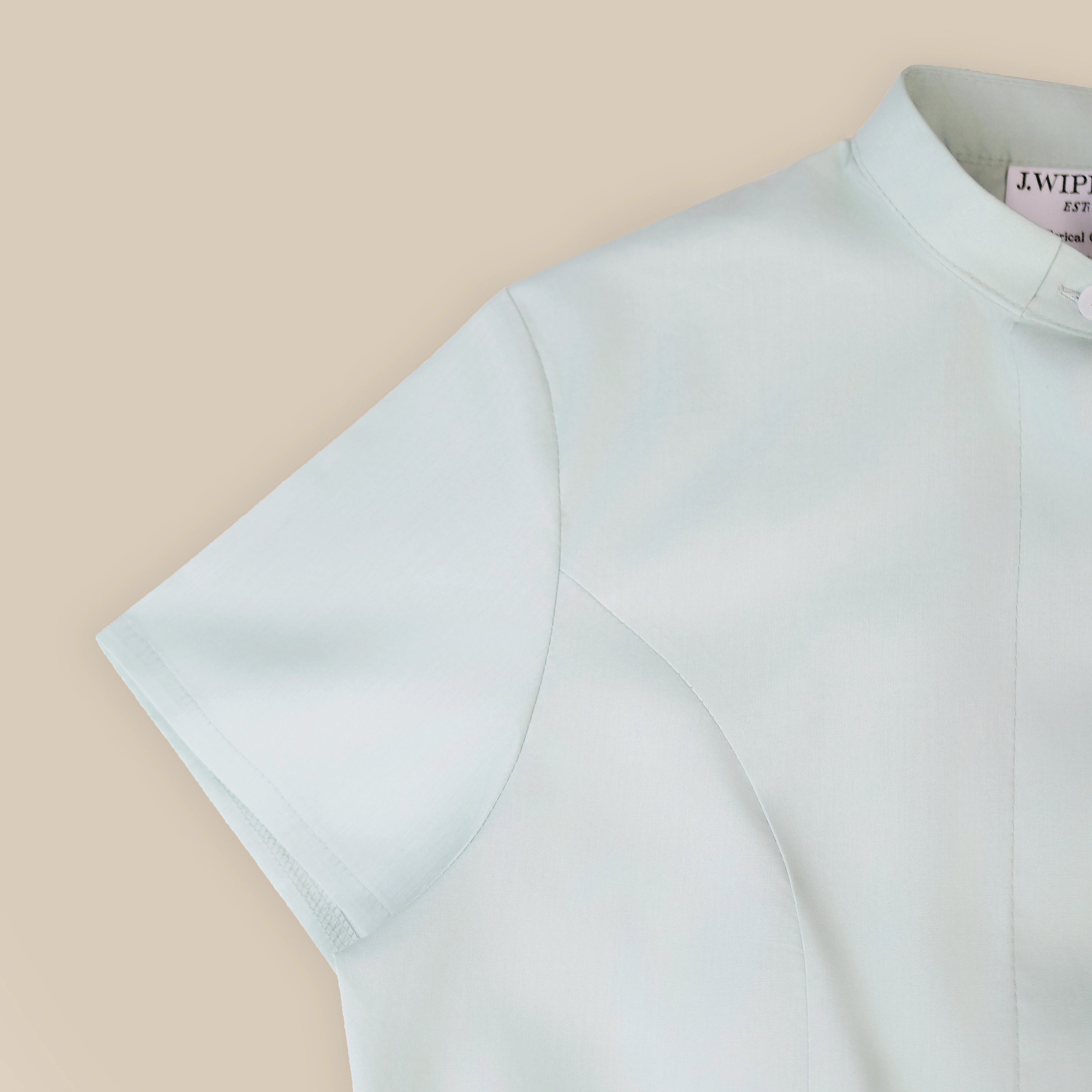 Women's Tonsure Clergy Shirt in light blue with semi-fitted design and short sleeves.