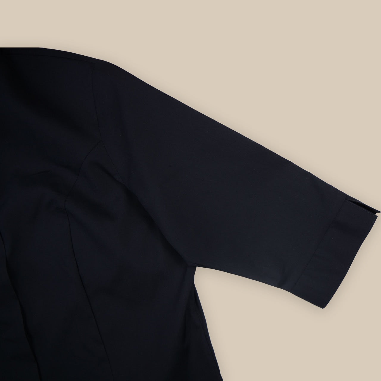 Women's Tonsure Clergy Shirt in black showing semi-fitted sleeve design.